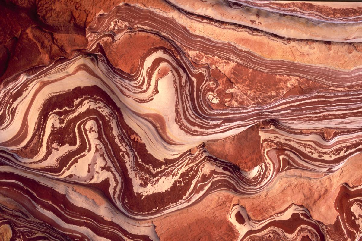 swirling colours of sandstone in the rock