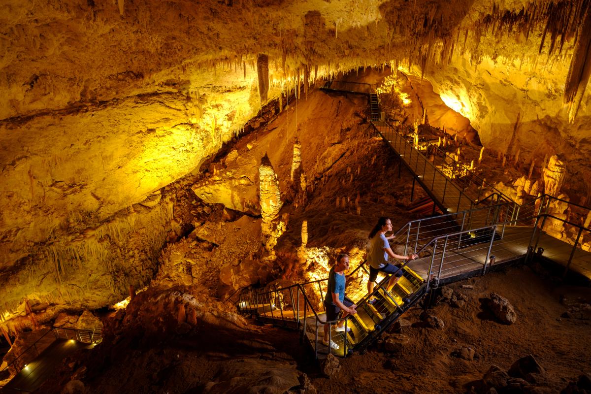 Couple walking up stairs in Jewel Cave