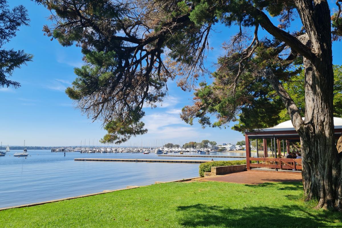 Perfect grassed picnic spot near the river with views to jetty and yacht club.